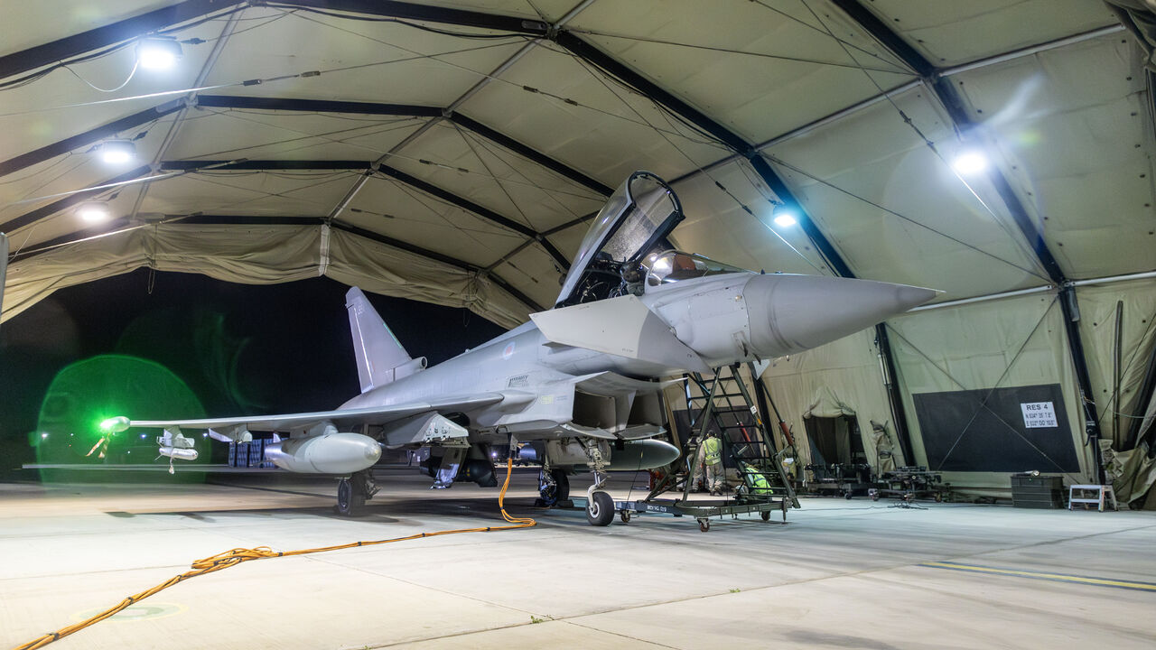 AKROTIRI, CYPRUS - JANUARY 12: In this handout image provided by the UK Ministry of Defence, an RAF Typhoon aircraft returns to berth following a strike mission on Yemen's Houthi rebels at RAF Akrotiri on January 12, 2024 in Akrotiri, Cyprus. On Thursday evening, four RAF Typhoons launched from RAF Akrotiri to conduct strikes against Yemen's Houthi rebels, who have been targeting merchant vessels in the Red Sea and Gulf of Aden with missiles and drones. According to British Prime Minister Rishi Sunak, the s