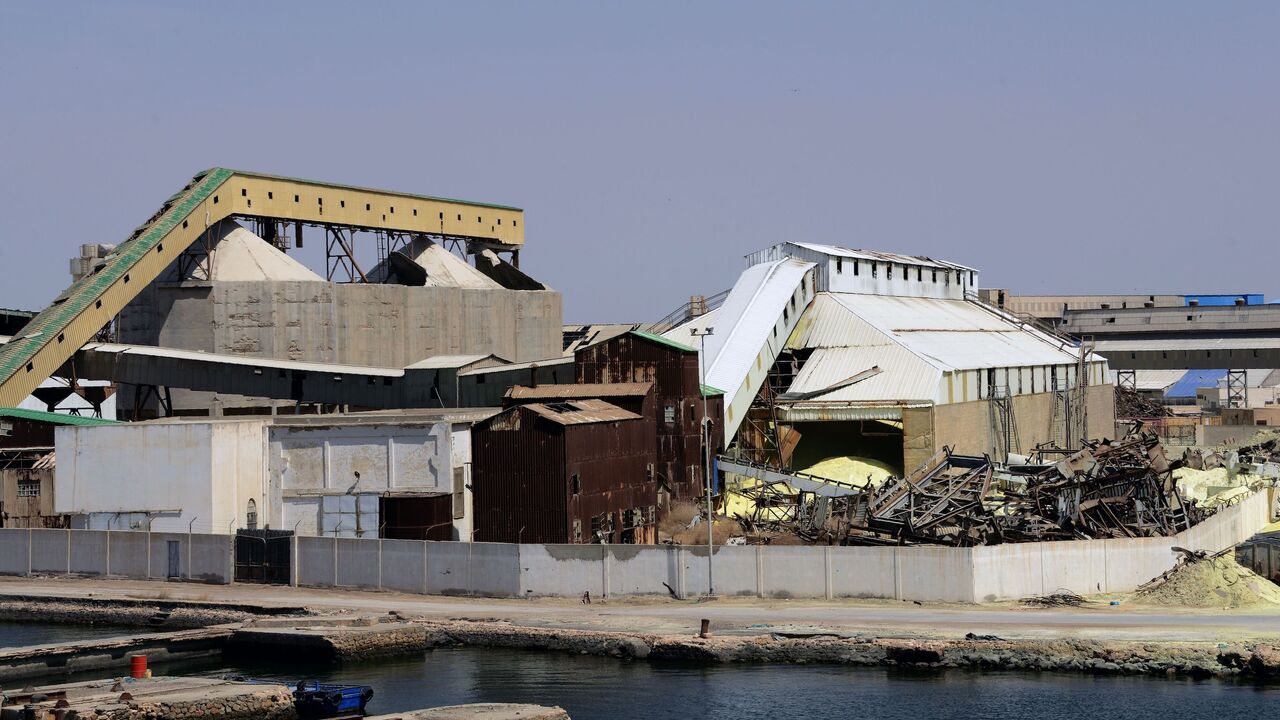 A picture taken on April 14, 2015 shows a view of a plant processing phosphates in the port of the Tunisian southern city of Sfax. / AFP / FETHI BELAID (Photo credit should read FETHI BELAID/AFP via Getty Images)