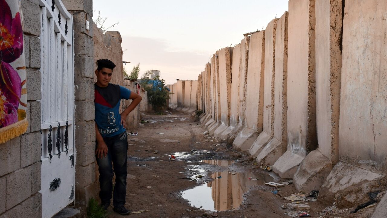 The wall was built when Samarra was at the heart of Iraq's sectarian civil war The wall was built when Samarra was at the heart of Iraq's sectarian civil war