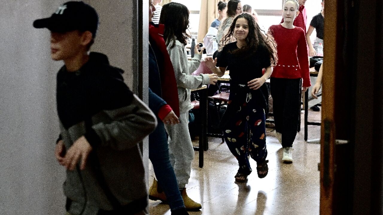 Students have to rush for a bomb shelter when missile alerts sound Students have to rush for a bomb shelter when missile alerts sound