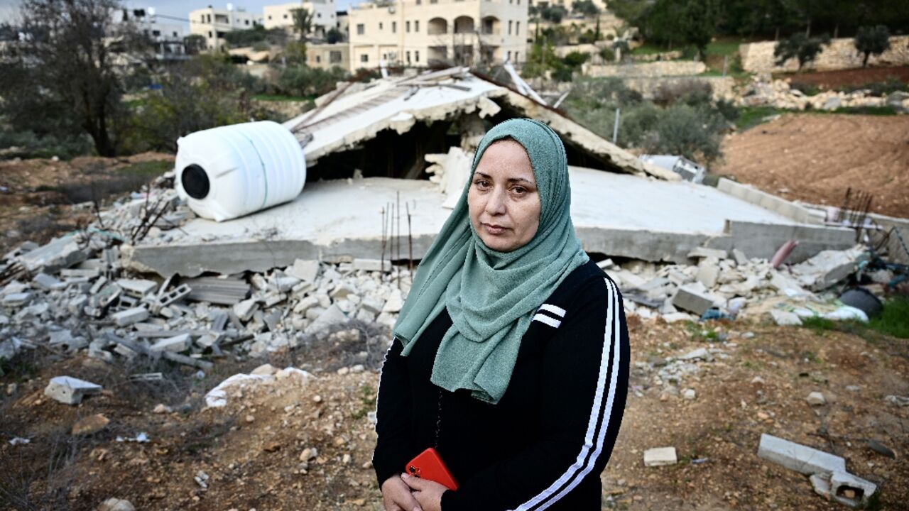 Palestinian villager Ghadeer al-Atrash in front of her bulldozed home in Al-Walaja