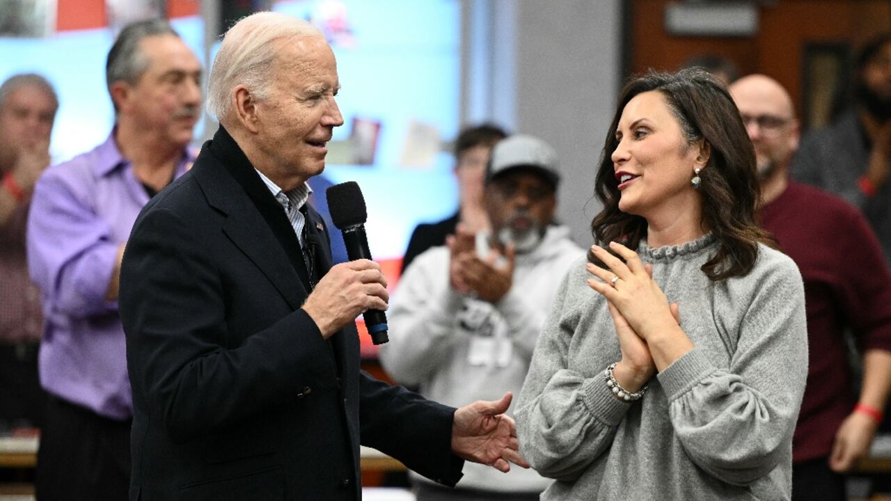 US President Joe Biden speaks alongside Michigan Governor Gretchen Whitmer as he campaigns in the Detroit area on February 1, 2024