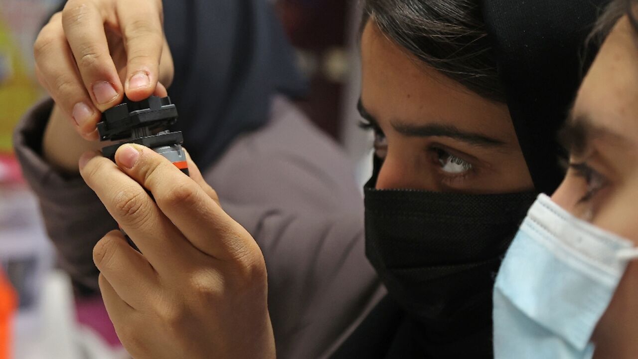 Members of an all-girl Afghan robotics team who fled the Taliban continue their studies in 2021 at the Qatar campus of Texas A&M, which the US university has announced will now close Members of an all-girl Afghan robotics team who fled the Taliban continue their studies in 2021 at the Qatar campus of Texas A&M, which the US university has announced will now close