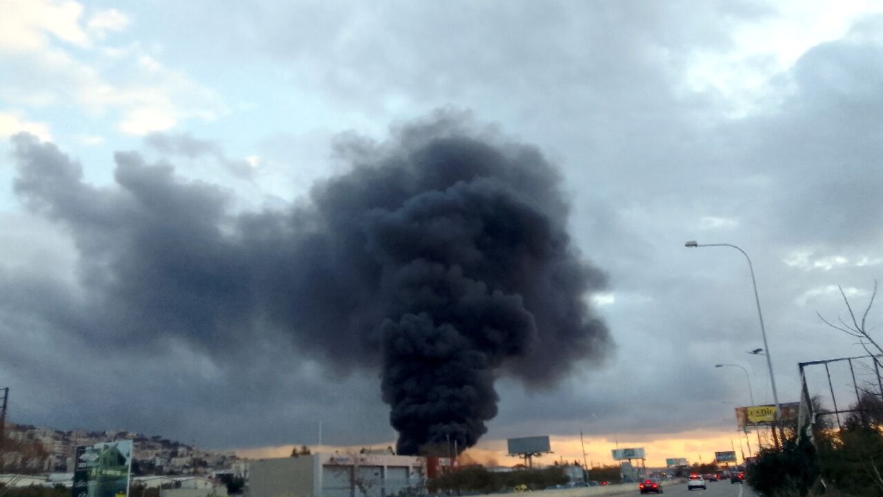 Smoke billows from the site of an Israeli air raid in the southern Lebanese town of Ghaziyeh on February 19