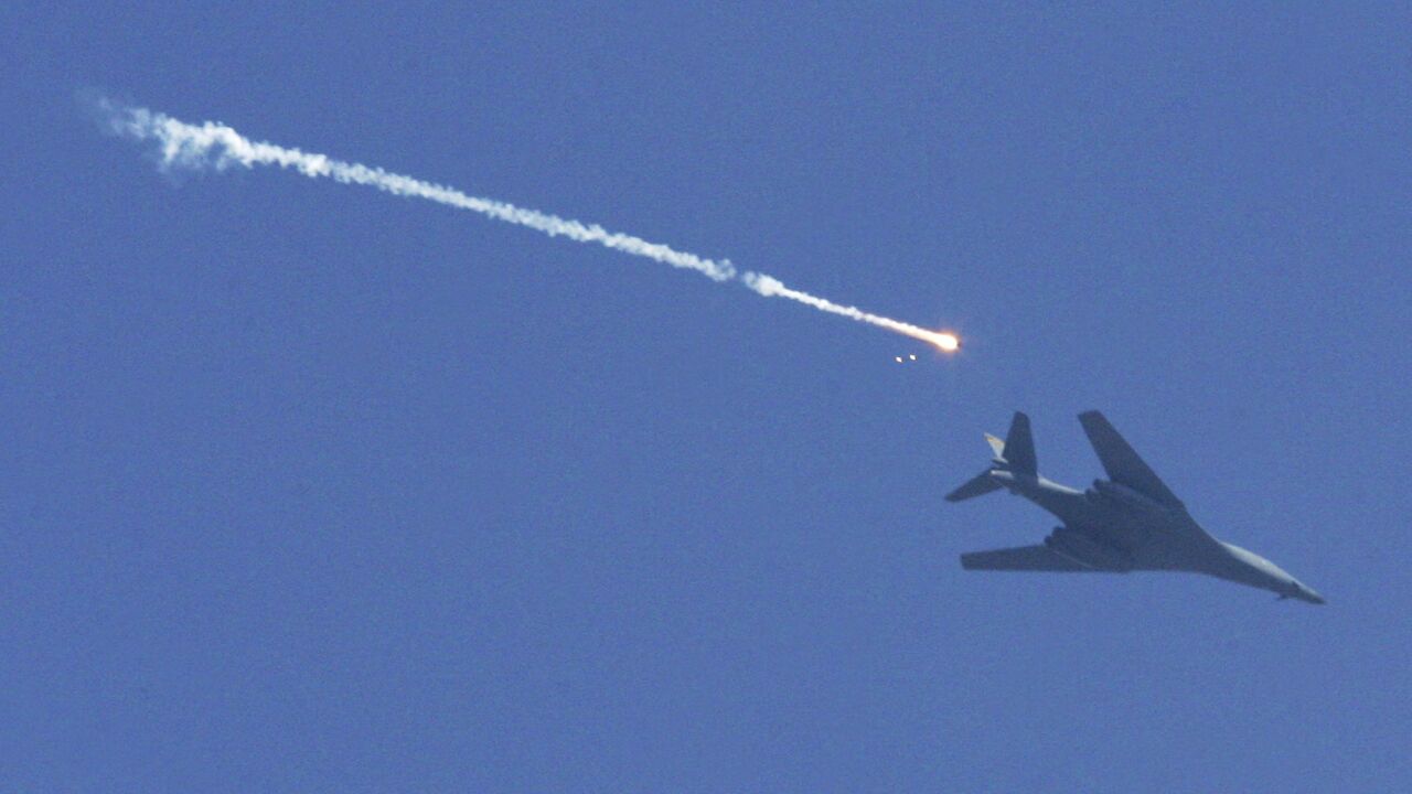 A US Air Force B-1 Bomber fires flares while providing air support for a US Army recon mission Oct. 27, 2006 in the Paktika province of Afghanistan near the Pakistan border.