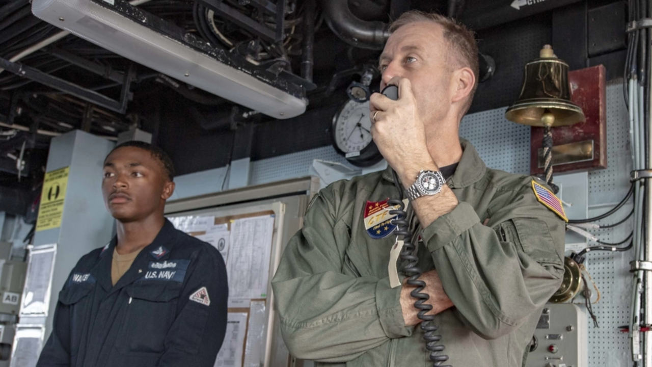 Rear Adm. George M. Wikoff, commander, Task Force (CTF) 70, speaks to the crew over the 1MC aboard the Arleigh Burke-class guided-missile destroyer USS McCampbell (DDG 85). 