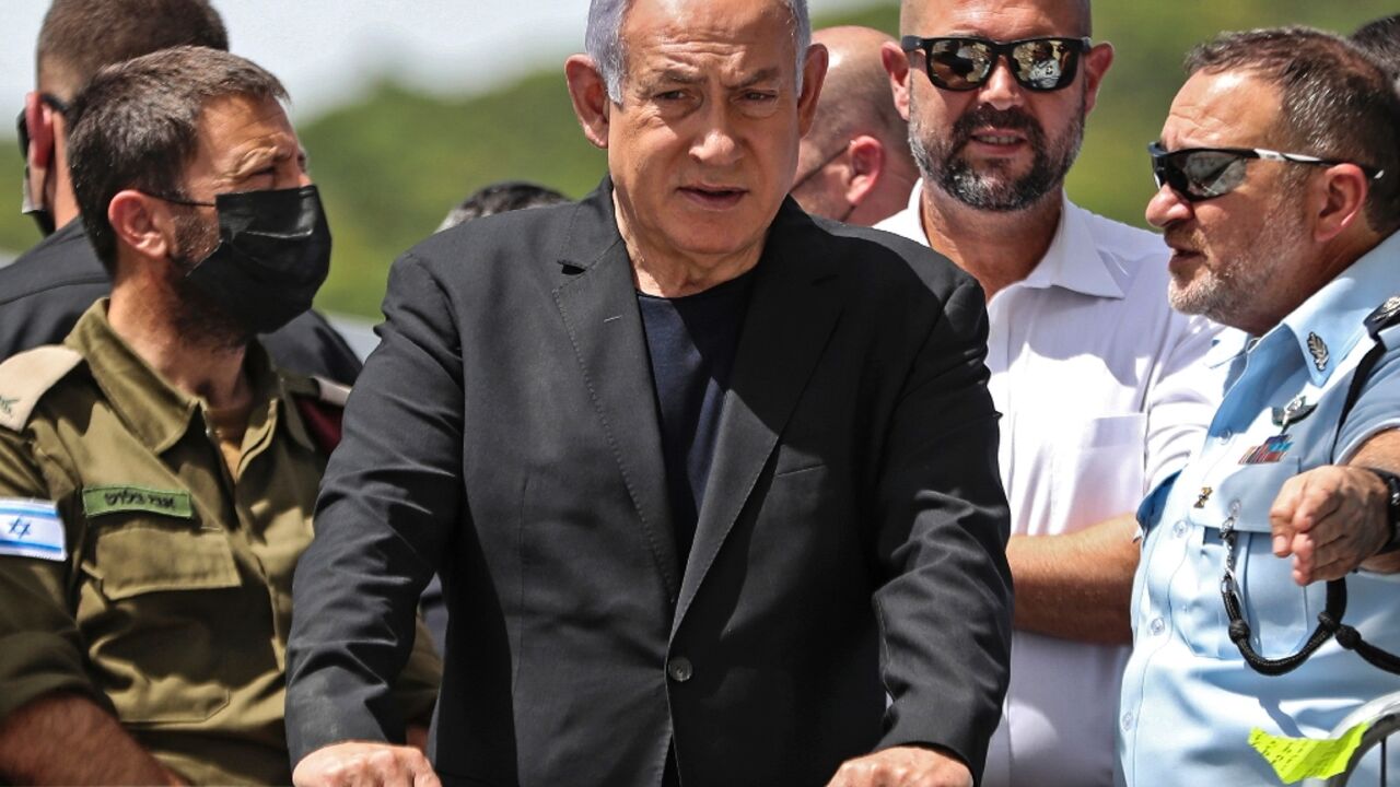 Israeli Prime Minister Benjamin Netanyahu, minister Amir Ohana and police chief Yaakov Shabtai, at the Mount Meron site