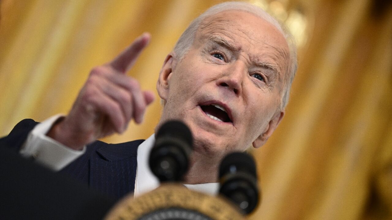 US President Joe Biden speaks during a reception honoring Women's History Month at the White House