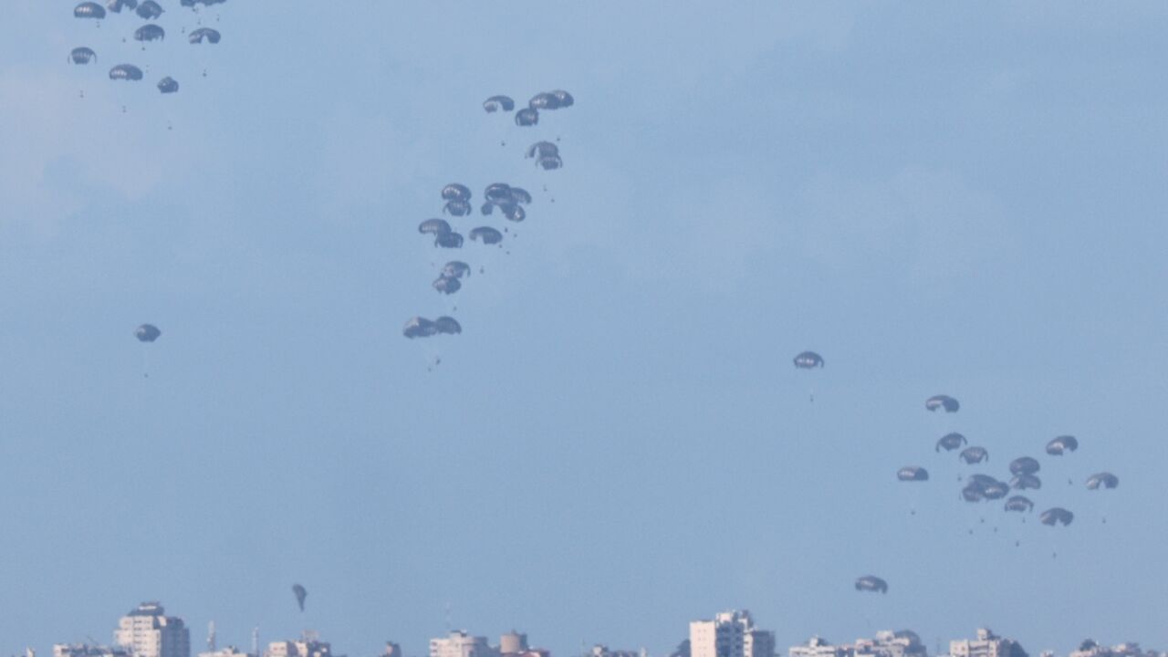The pallets of humanitarian aid being airdropped into northern Gaza The pallets of humanitarian aid being airdropped into northern Gaza
