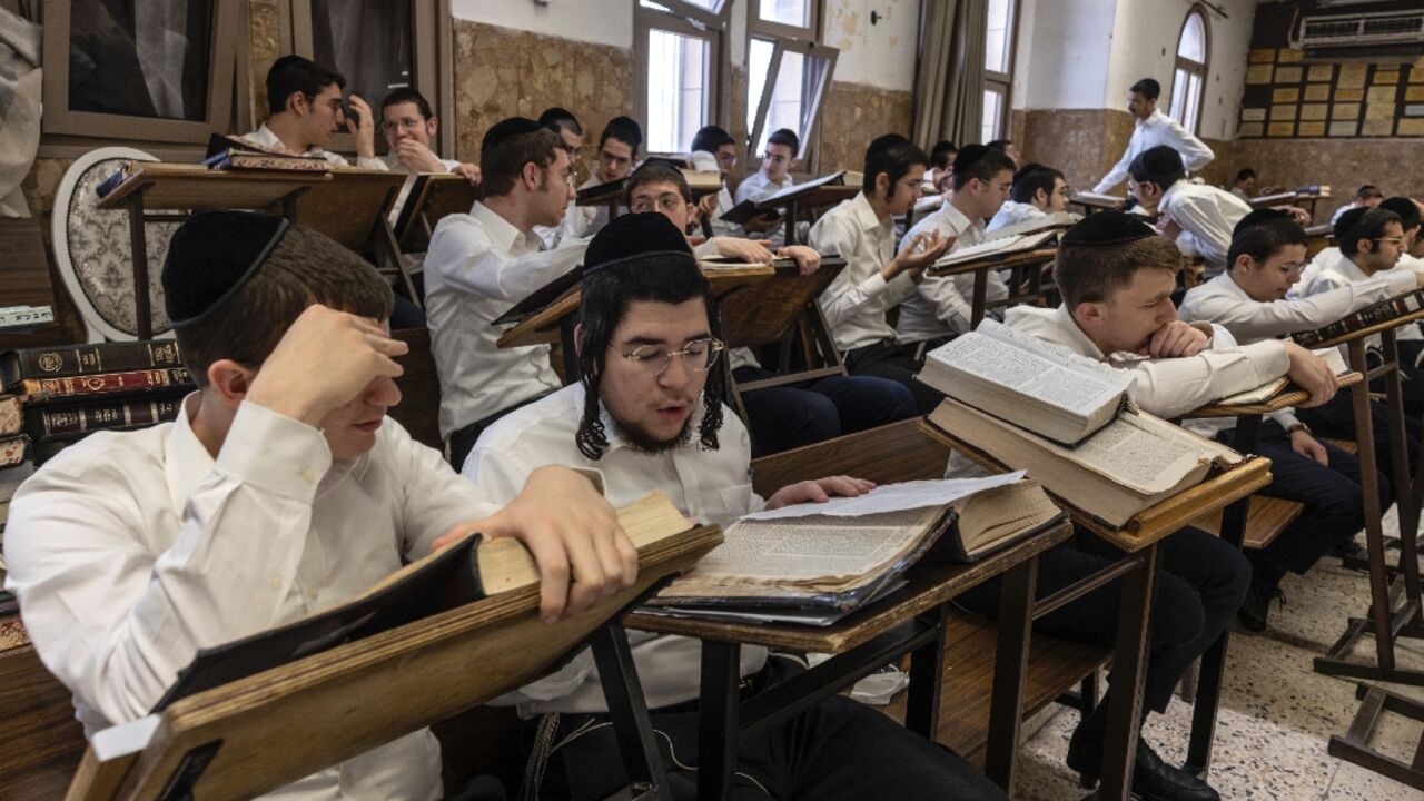 Ultra-Orthodox Jews study the Torah at the Ponevezh yeshiva in the central Israeli city of Bnei Brak