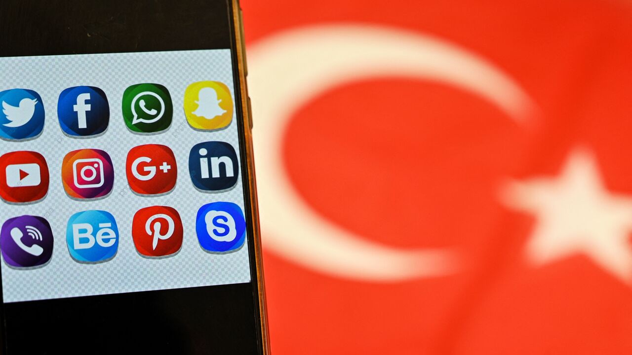 This picture taken on Sept. 30, 2020, shows logos of social-networking websites displayed on a mobile phone's screen in Istanbul. 