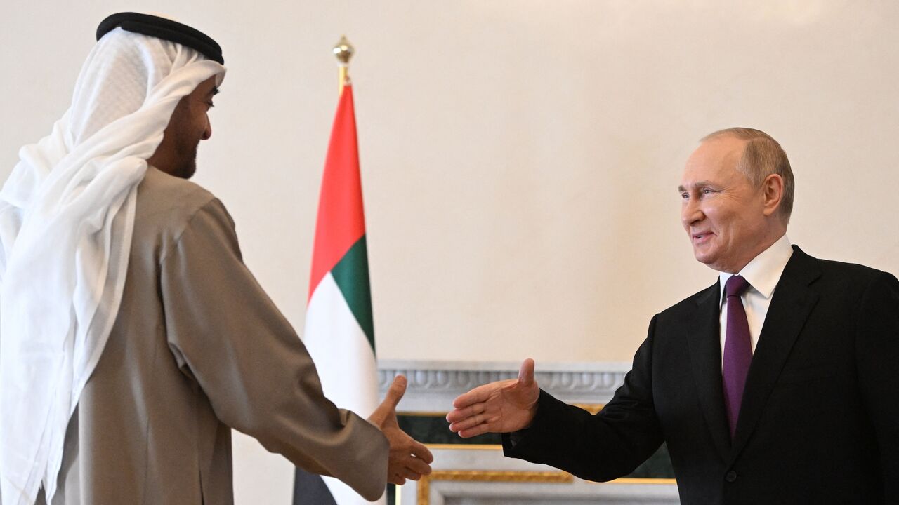 Russian President Vladimir Putin meets with United Arab Emirates President Sheikh Mohamed bin Zayed Al-Nahyan in Saint Petersburg on Oct. 11, 2022.