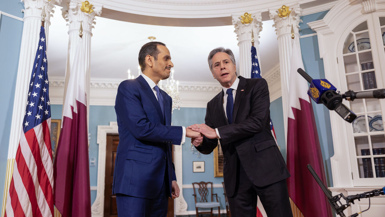 Qatari Prime Minister and Foreign Minister Mohammed Bin Abdulrahman Al Thani greets Secretary of State Antony Blinken (R) in the Treaty Room of the State Department on March 5, 2024 in Washington, DC. 