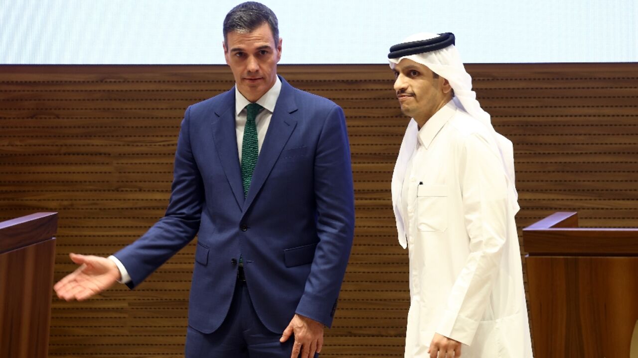 Spanish Prime Minister Pedro Sanchez and his Qatari counterpart Sheikh Mohammed bin Abdulrahman bin Jassim al-Thani give a joint press conference in Doha