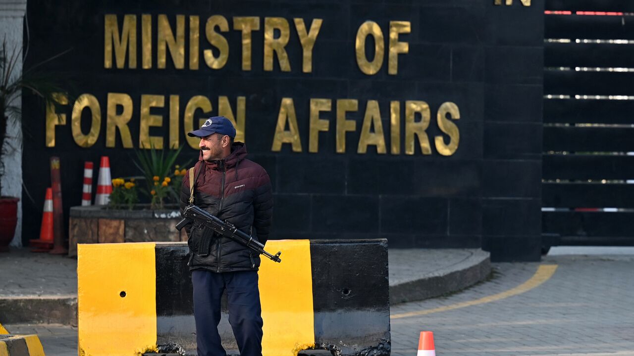 A Pakistani police officer stands guard outside the Ministry of Foreign Affairs in Islamabad on Jan. 18, 2024.