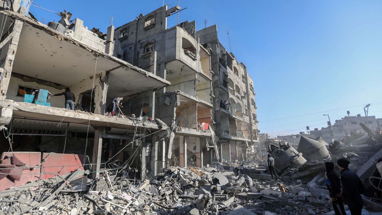Citizens inspect the effects of the destruction of Al-Farouq Mosque and the buildings destroyed by the Israeli raids on Feb. 22, 2024 in Rafah, Gaza.