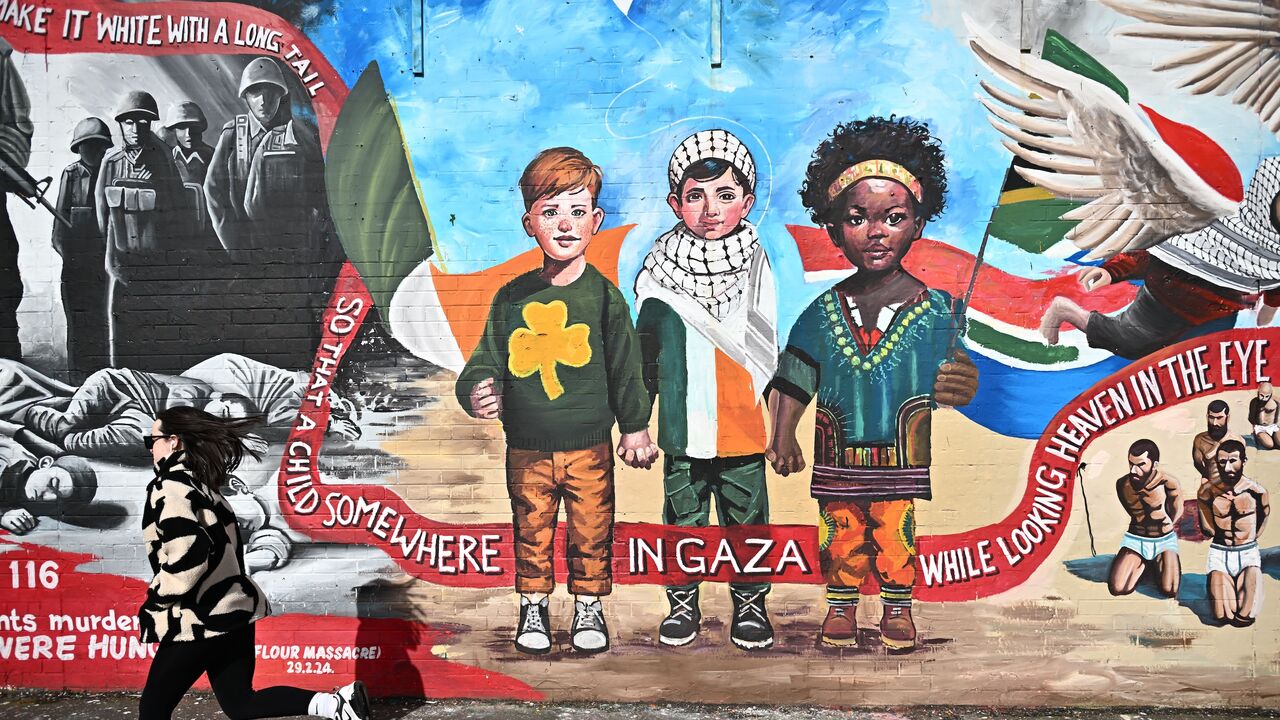Palestinian solidarity murals can be seen on the International Wall on the Falls Road on March 18, 2024, in Belfast, Northern Ireland.