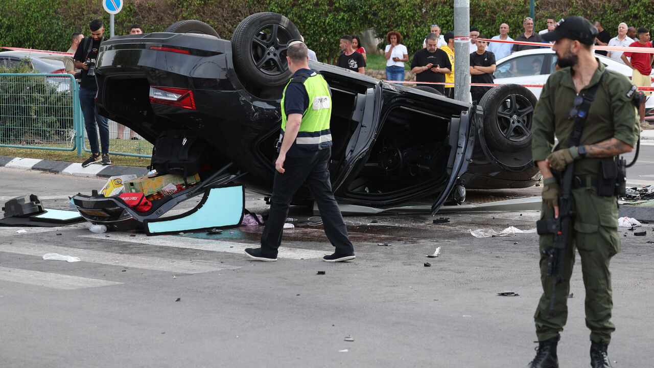 Israeli police cordon off the site of a car accident, where Israeli minister Itamar Ben-Gvir was lightly hurt after his car was involved in an accident, in Ramla south of Tel Aviv, on April 26, 2024.