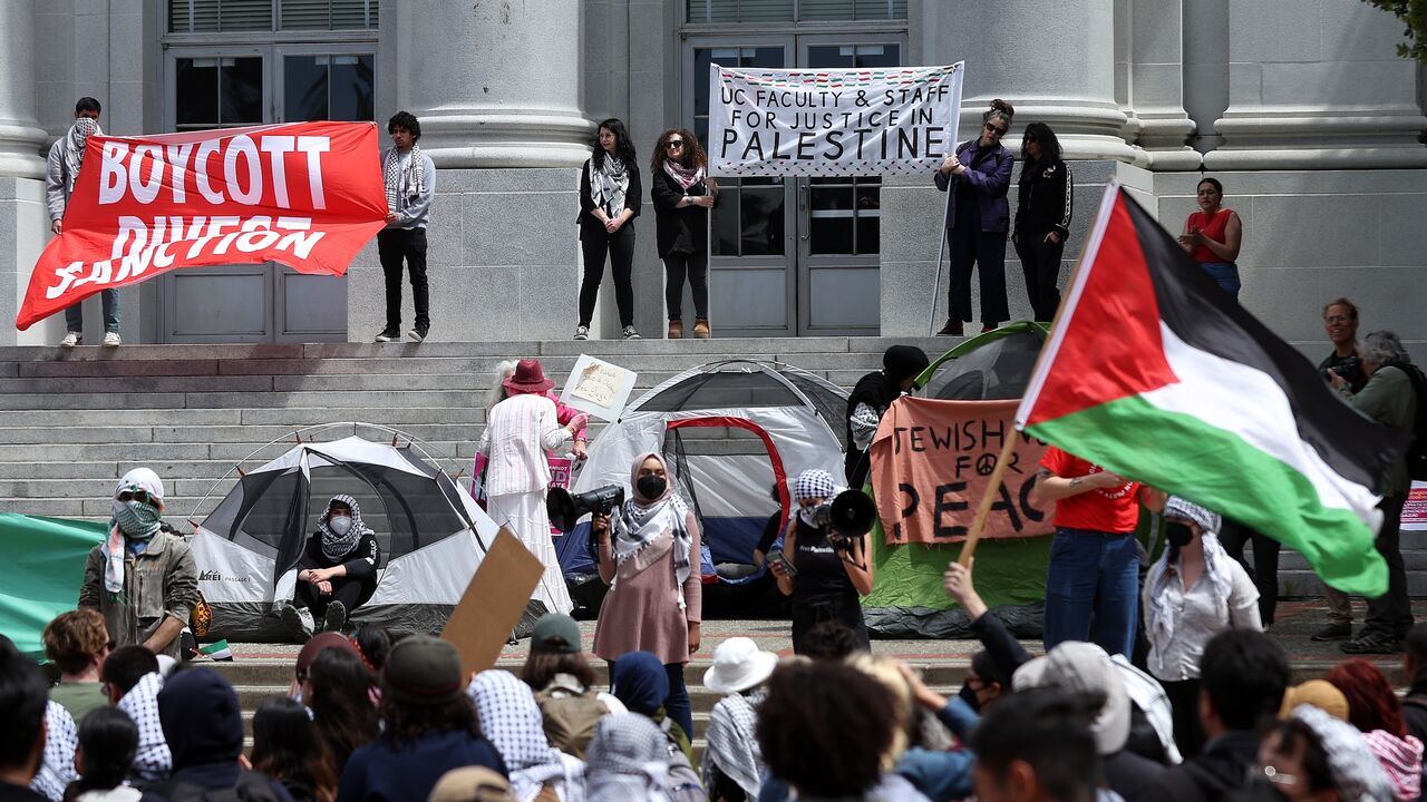 Pro-Palestinian protesters set up a tent encampment during a demonstration in front of Sproul Hall on the UC Berkeley campus on April 22, 2024, in Berkeley, California.