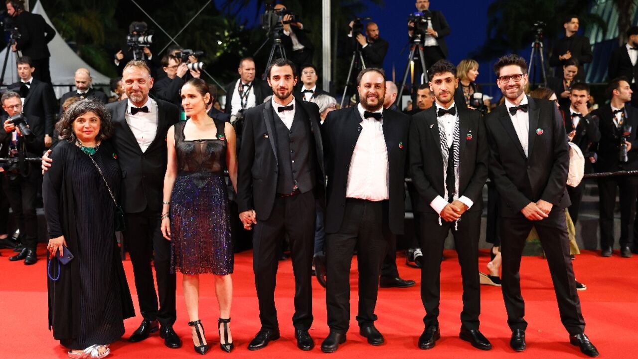 Palestinian-Danish director Mahdi Fleifel (third right) brought actors Mahmood Bakri (centre) and Aram Sabbagh (second right) to Cannes Palestinian-Danish director Mahdi Fleifel (third right) brought actors Mahmood Bakri (centre) and Aram Sabbagh (second right) to Cannes