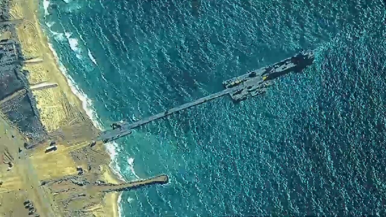 A US military picture taken on May 16, 2024 shows the temporary pier attached to the Gaza coast