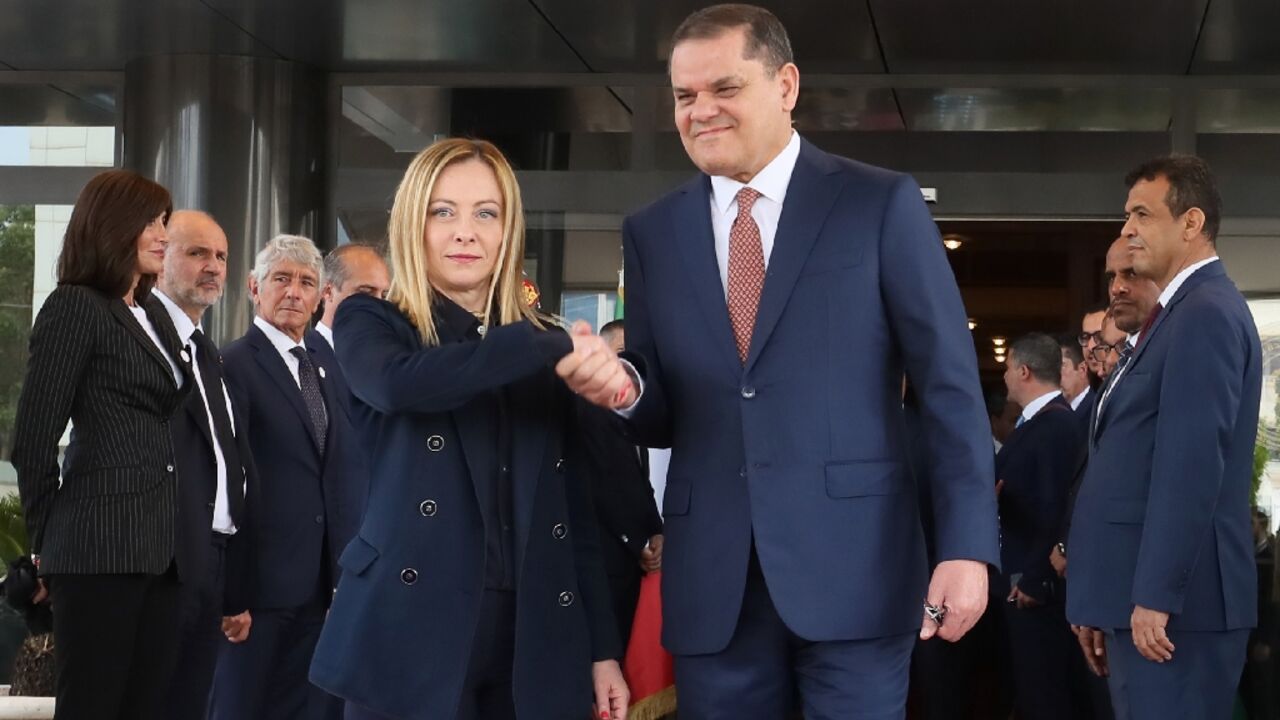 Italy's Giorgia Meloni being welcomed by interim Prime Minister Abdulhamid Dbeibah