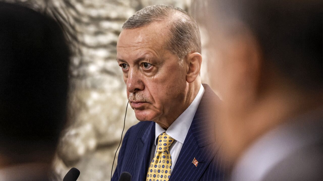 Turkey's president, Recep Tayyip Erdogan, looks on during a joint statement to the media in Baghdad on April 22, 2024. 