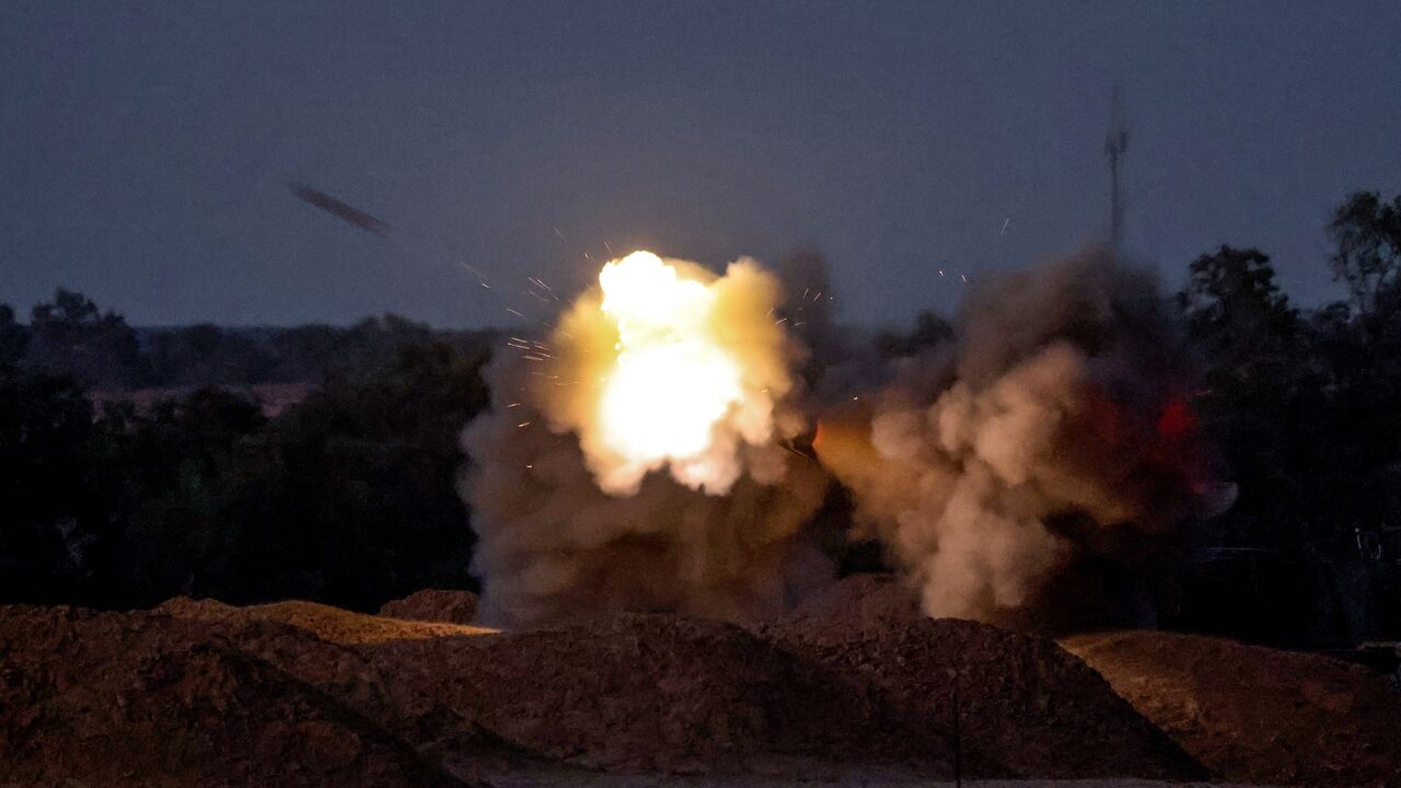 An Israeli mobile artillery unit fires a shell from a border position in southern Israel toward the Gaza Strip on May 8, 2024, amid the ongoing conflict in the Palestinian territory between Israel and the Hamas movement. 