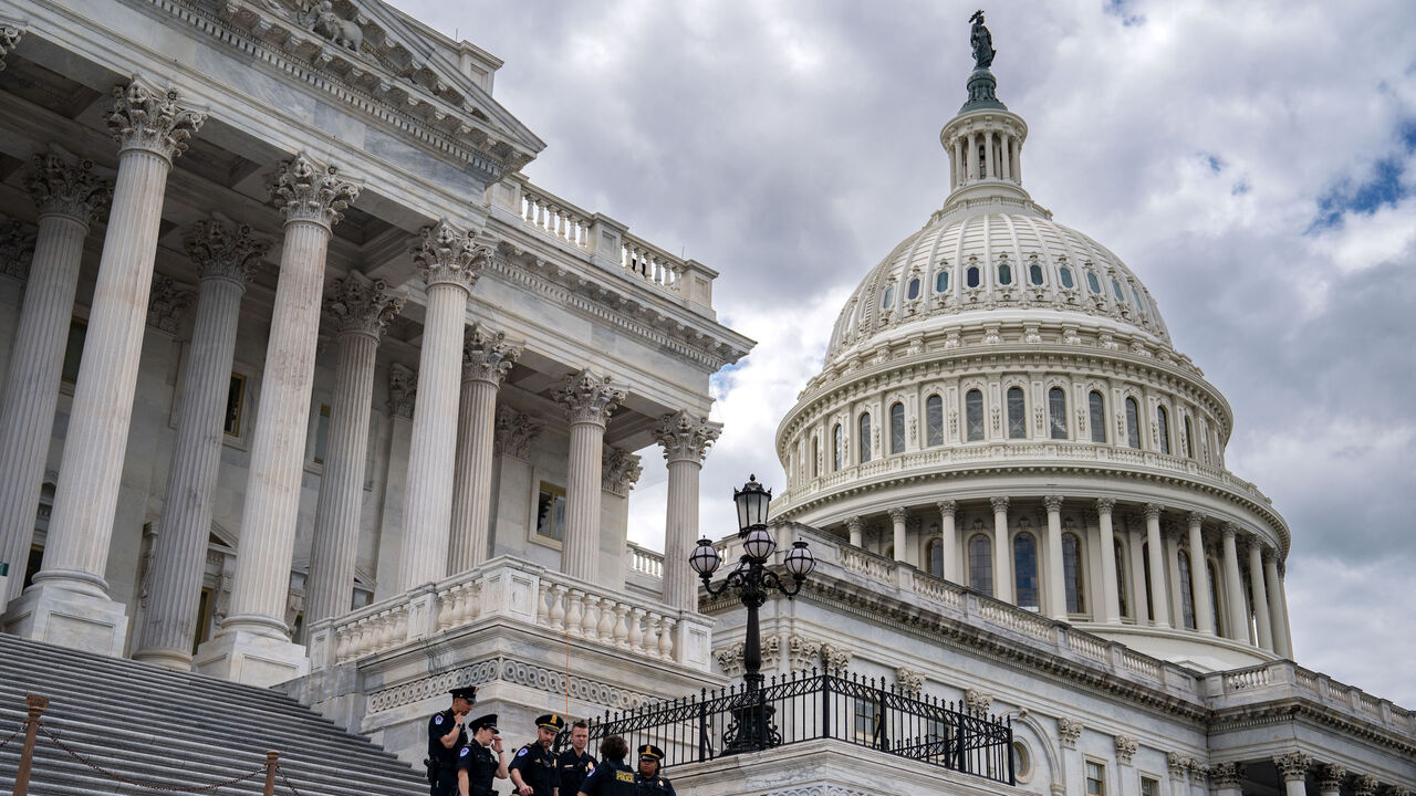 Capitol Police Officers gather on the steps of the House of Representatives ahead of a protest by Congressional aides advocating for a cease-fire in the war between Israel and Hamas at the U.S. Capitol on May 16, 2024 in Washington, DC.
