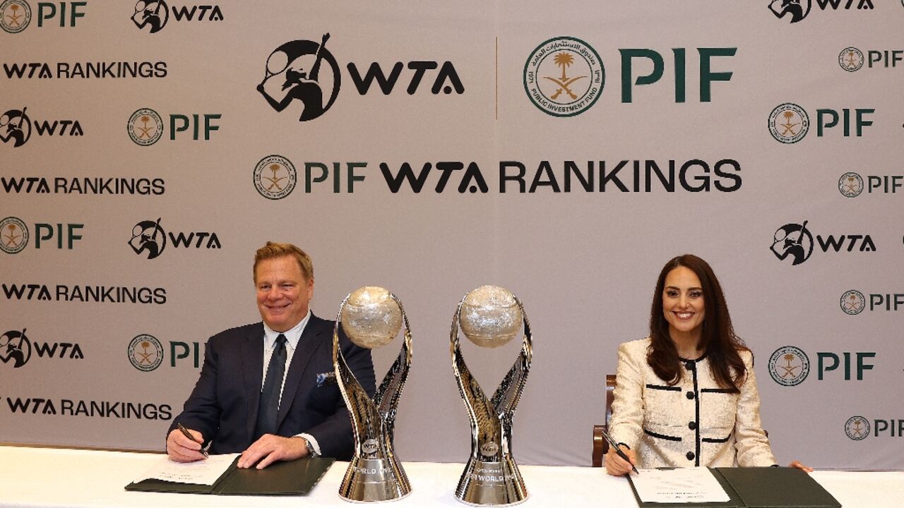 Kevin Foster, Head of Corporate Affairs for the Saudi Public Investment Fund and and Marina Storti, chief executive of WTA Ventures, announce a new multi-year partnership between the women's tennis circuit and PIF Kevin Foster, Head of Corporate Affairs for the Saudi Public Investment Fund and and Marina Storti, chief executive of WTA Ventures, announce a new multi-year partnership between the women's tennis circuit and PIF