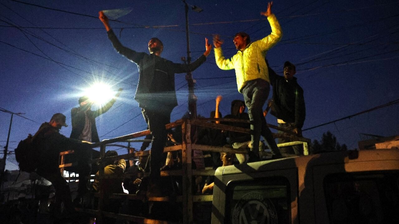 Palestinians celebrate in Rafah, in the southern Gaza Strip, after Hamas announced it accepted a truce proposal Palestinians celebrate in Rafah, in the southern Gaza Strip, after Hamas announced it accepted a truce proposal