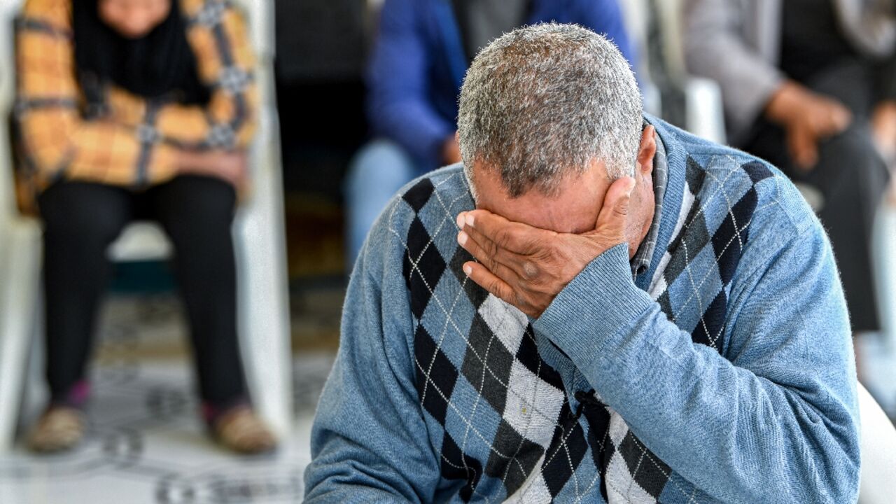 A family member of one of the Tunisian migrants who were lost at sea in January struggles to contain his emotions A family member of one of the Tunisian migrants who were lost at sea in January struggles to contain his emotions