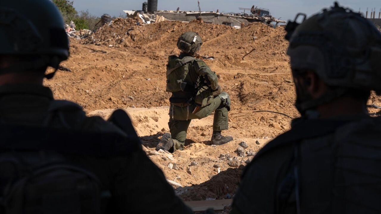 A picture released by the Israeli army on May 10, 2024 of soldiers in the southern Gaza Strip A picture released by the Israeli army on May 10, 2024 of soldiers in the southern Gaza Strip