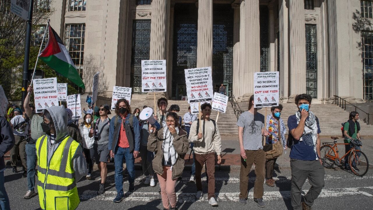 Pro-Palestinian protesters march across campus at the Massachusetts Institute of Technology (MIT) after three other protesters were arrested for blocking a parking garage in Cambridge, Massachusetts, on May 9, 2024 Pro-Palestinian protesters march across campus at the Massachusetts Institute of Technology (MIT) after three other protesters were arrested for blocking a parking garage in Cambridge, Massachusetts, on May 9, 2024