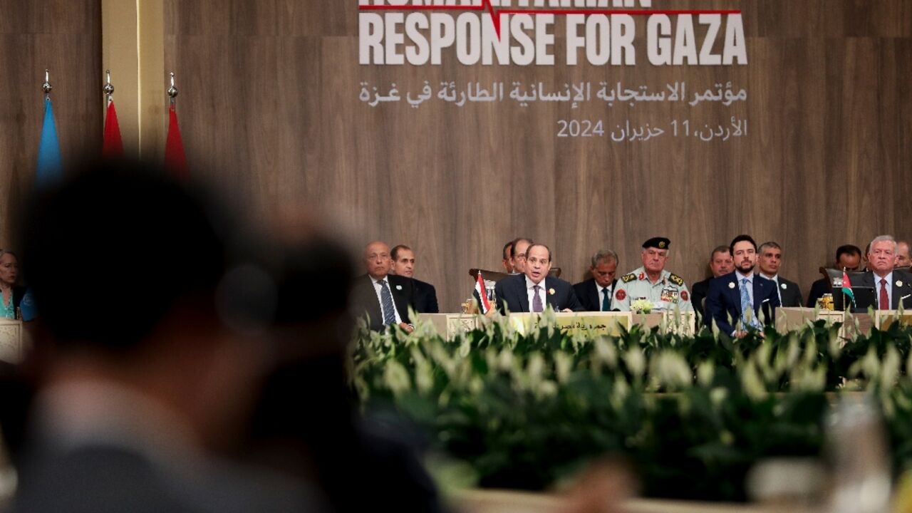 Jordan's King Abdullah II (right) takes part in an emergency summit on Gaza aid in Sweimeh on the shores of the Dead Sea in Jordan Jordan's King Abdullah II (right) takes part in an emergency summit on Gaza aid in Sweimeh on the shores of the Dead Sea in Jordan