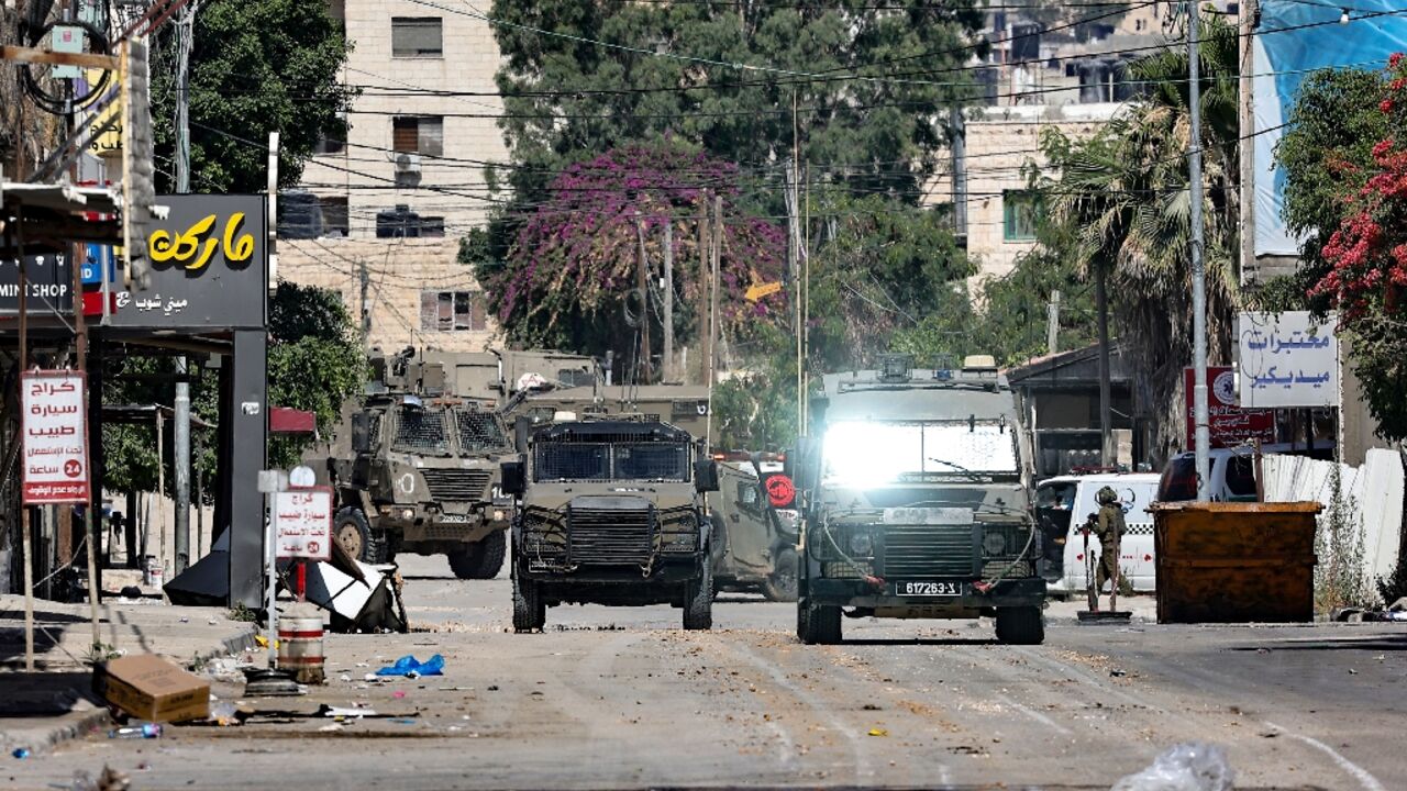 Israeli army vehicles at the entrance to Jenin in the occupied West Bank during the raid