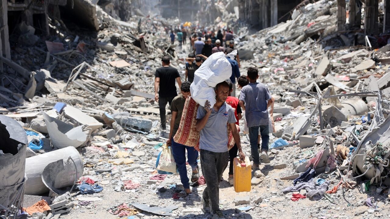 Scores of Palestinians streaming into north Gaza's Jabalia area, trying to find their homes and salvage whatever belongings are left