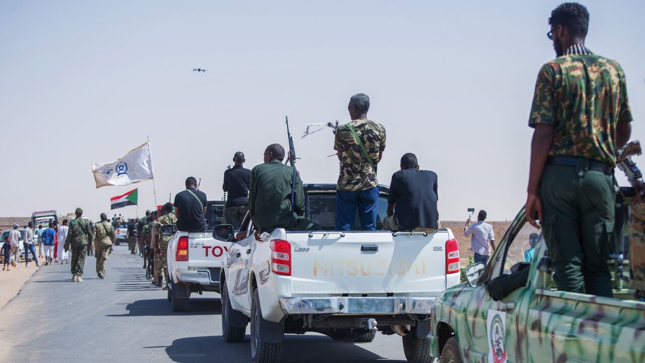 Members of the Sudanese army's Special Mission Forces battalion in the Northern State hold a parade in Karima city on May 19, 2024.