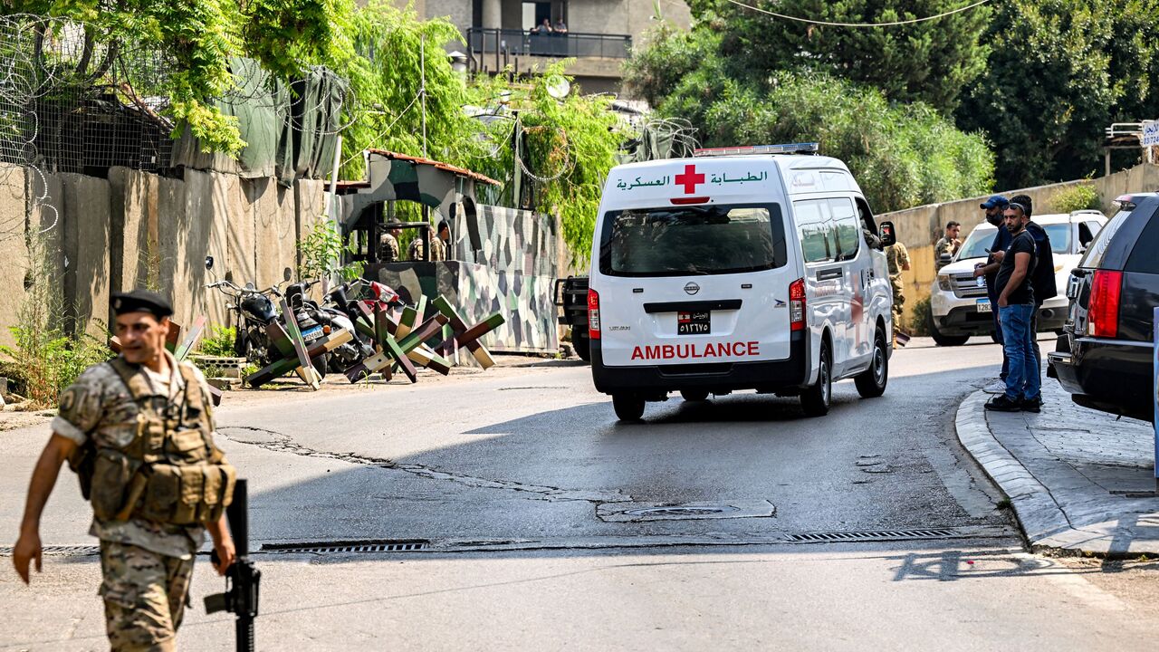 An ambulance is pictured as Lebanese army deploy near the US embassy in Beirut on June 5, 2024, after a Syrian man was arrested following a shooting near the embassy.