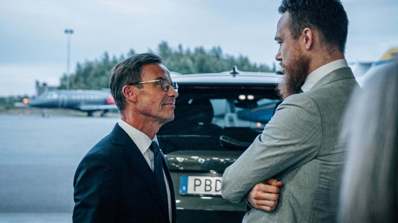 Kristersson (left) welcomed some of the hostages back last weekend Kristersson (left) welcomed some of the hostages back last weekend