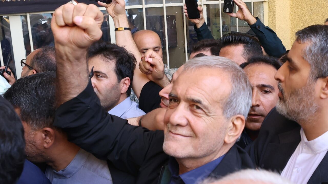 Iranian reformist candidate Masoud Pezeshkian reacts after casting his ballot during the presidential runoff election, in which he was later declared the winner Iranian reformist candidate Masoud Pezeshkian reacts after casting his ballot during the presidential runoff election, in which he was later declared the winner