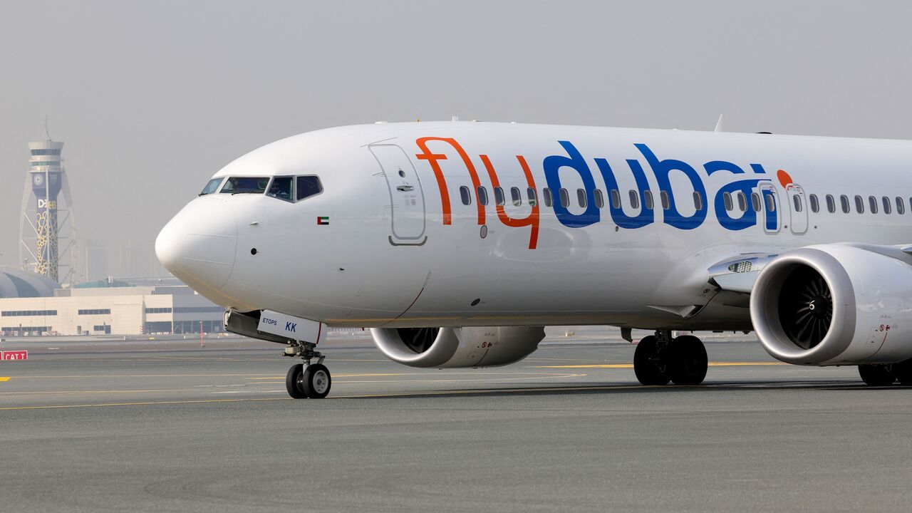 A flydubai Boeing 737 Max taxis at Dubai International Airport in Dubai, on Nov. 22, 2023. 