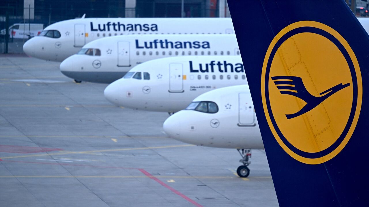 The logo of German airline Lufthansa can be seen on the vertical stabilizer of a plane standing with other Lufthansa aircrafts at the airport in Frankfurt am Main, western Germany, on March 7, 2024. 