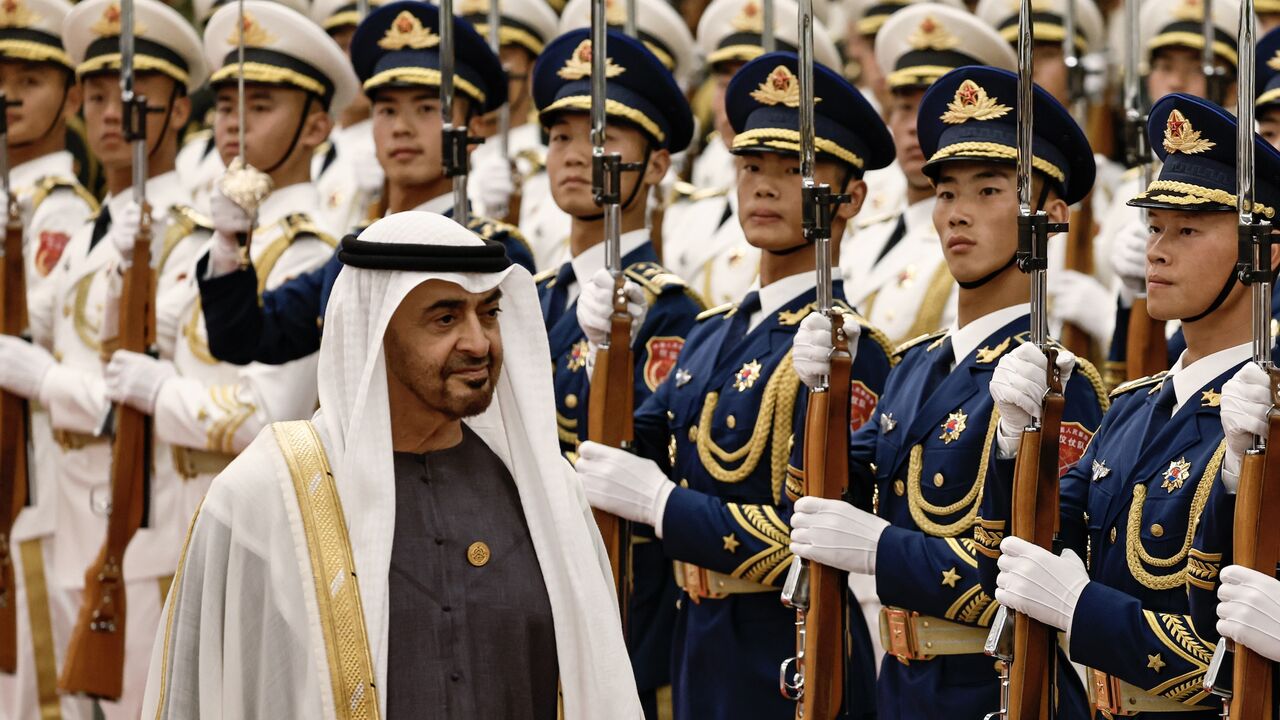 United Arab Emirates President Sheikh Mohammed bin Zayed Al Nahyan reviews the honour guard.