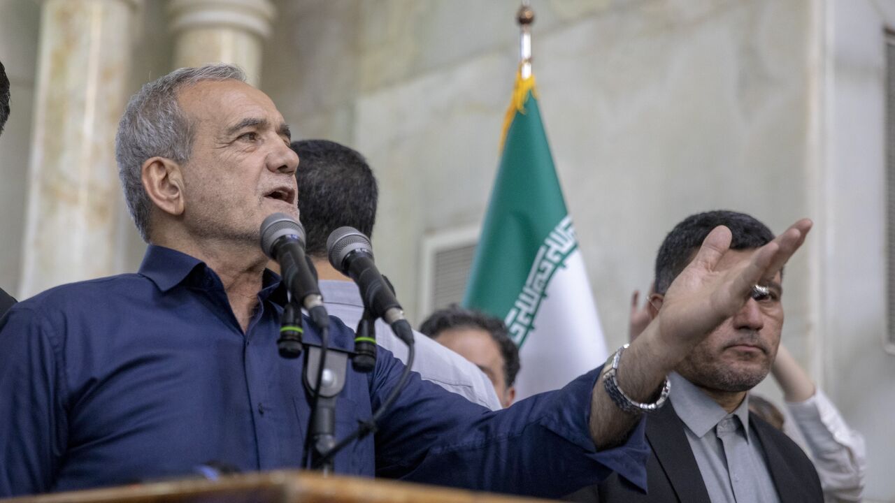 Newly elected Iranian President Masoud Pezeshkian speaks during a visit to the shrine of the Islamic Republic's founder, Ayatollah Ruhollah Khomeini, on July 6, 2024, in Tehran, Iran.