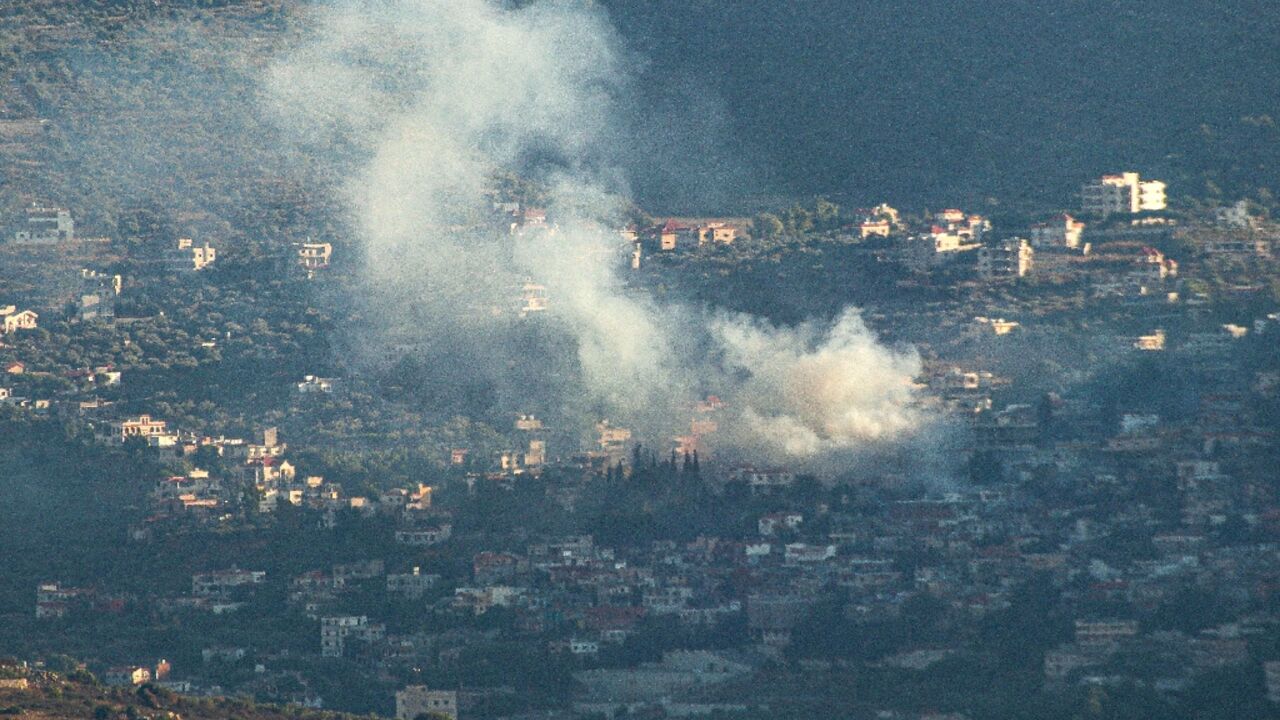 Smoke bilows following an Israeli strike in the village of Kfar Kila in southern Lebanon on July 16, 2024