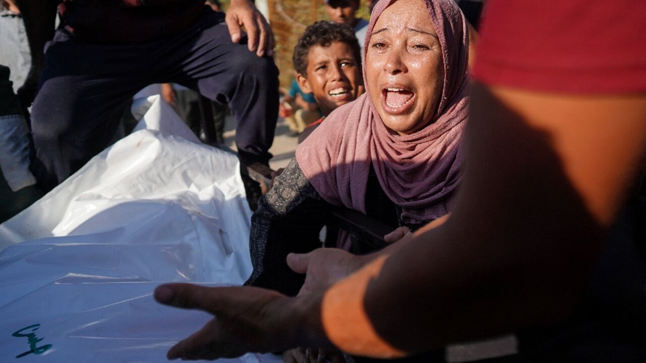 A woman in Khan Yunis mourns one of nearly 40,000 Gazans killed by the war, according to the figures from Hamas-run Gaza's health ministry