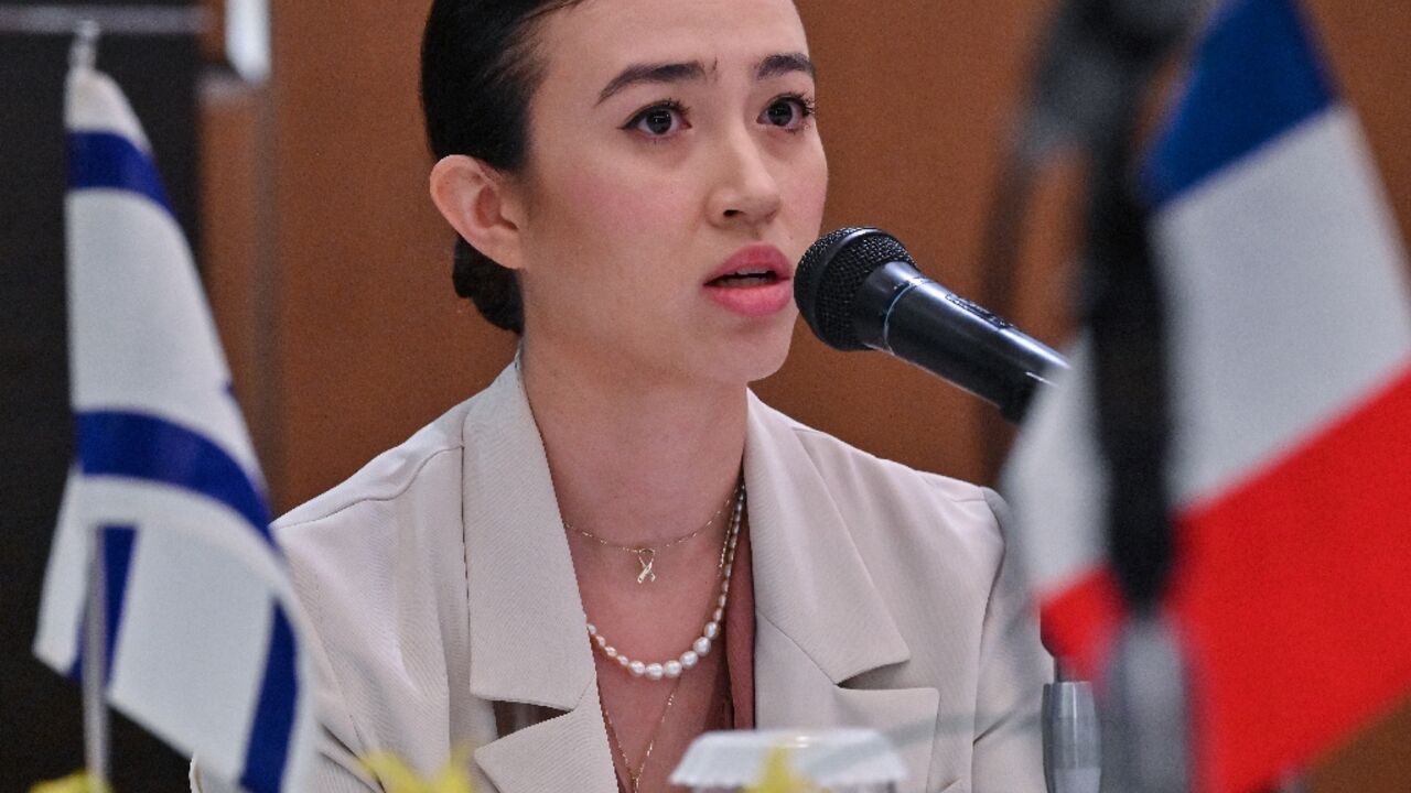 Noa Argamani, who was abducted from the Nova music festival on October 7, speaks during a meeting with diplomats from Israel and G7 countries in Tokyo