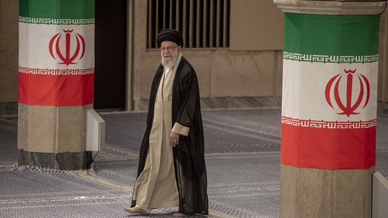 Iran's supreme leader, Ayatollah Ali Khamenei, seen as he casts his vote for the snap presidential election at the Imam Khomeini Husseiniya on June 28, 2024, in Tehran, Iran.