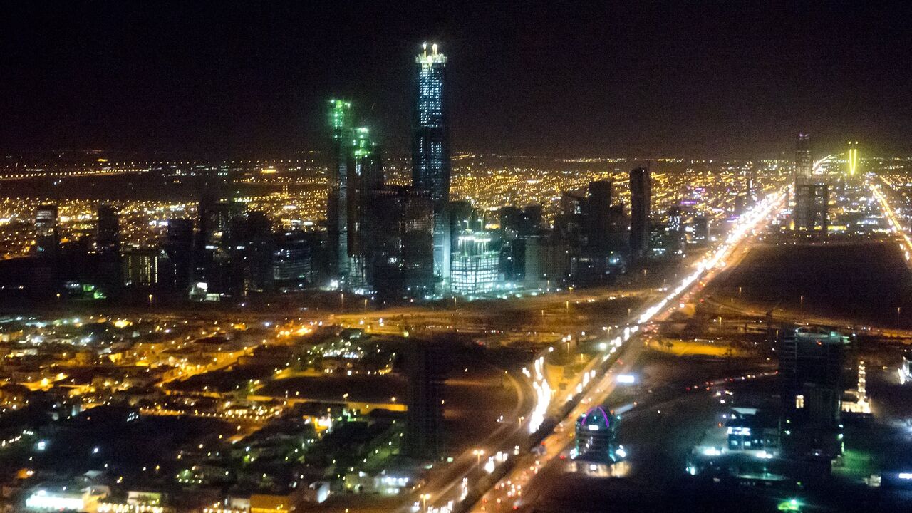 The skyline of Riyadh, Saudi Arabia, March 28, 2014, is seen at night in this aerial photograph from a helicopter. 